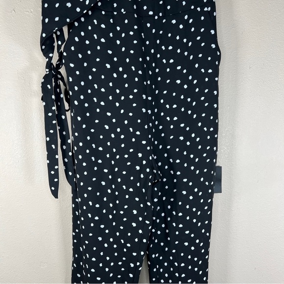 NEW LULUS XS JUMPSUIT BLACK WHITE POLKA DOT V NECK ASYMMETRICAL SLEEVE RETRO - Picture 5 of 15